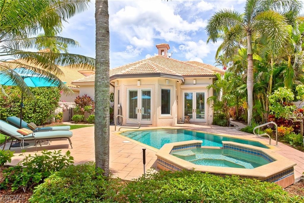 2729 Wulfert Road Sanibel, FL 33957 - Photo 29 of 31 a view of a house with pool and sitting area
