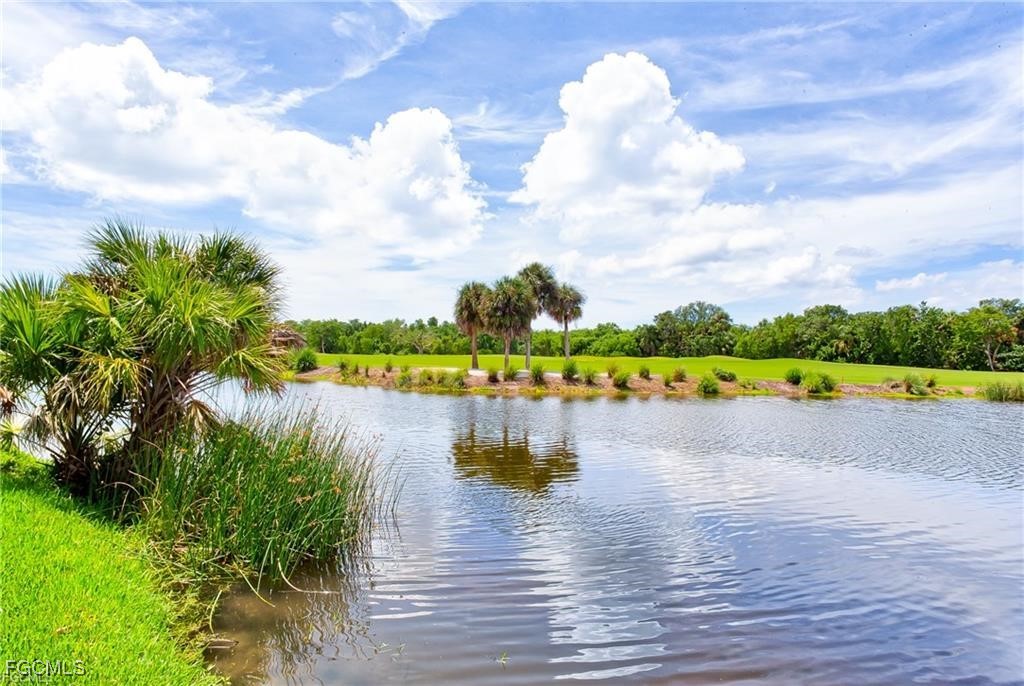 2729 Wulfert Road Sanibel, FL 33957 - Photo 30 of 31 a view of a lake with houses in the back