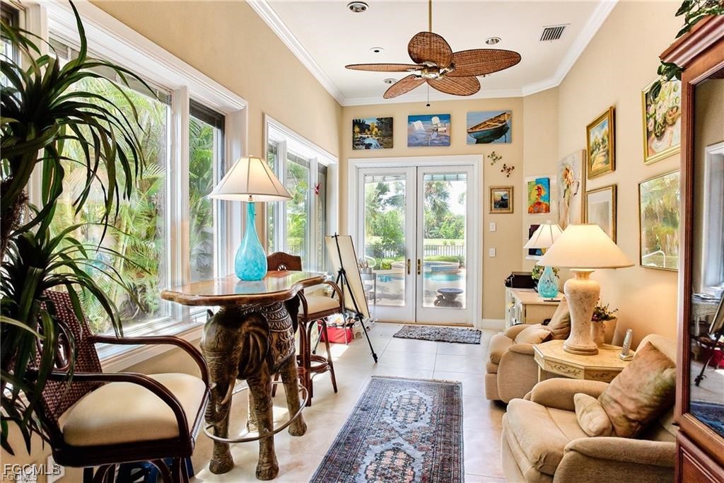 2729 Wulfert Road Sanibel, FL 33957 - Photo 8 of 31 a living room with furniture and a large window