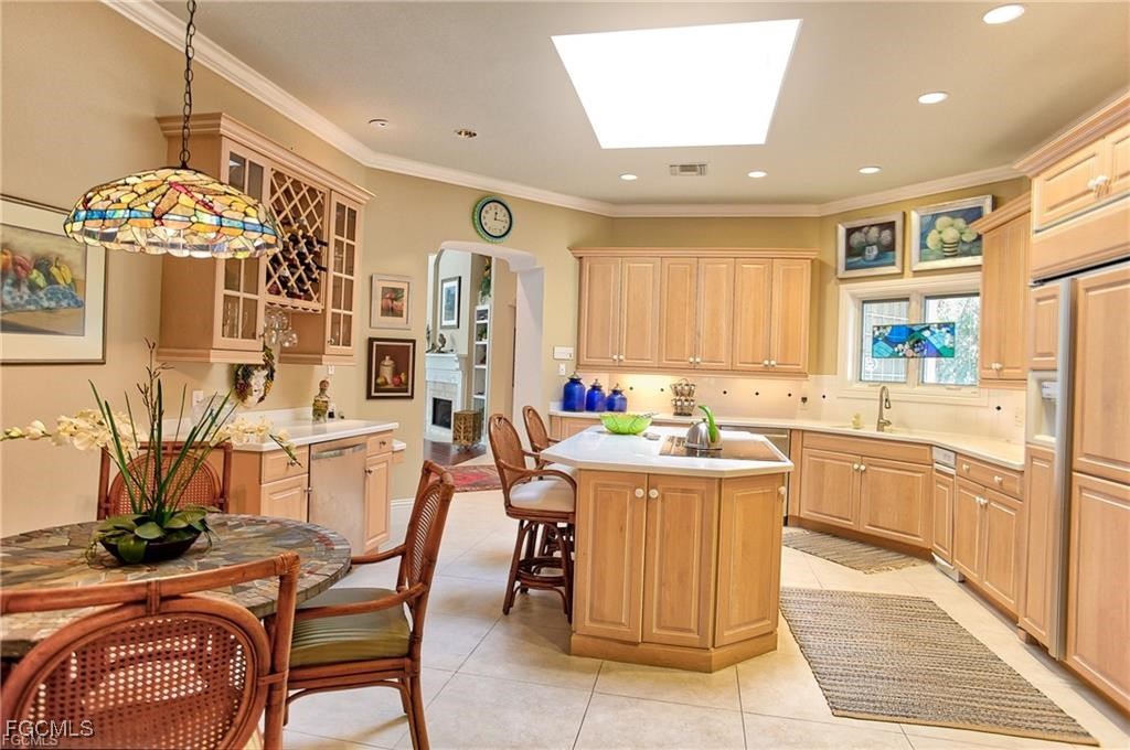2729 Wulfert Road Sanibel, FL 33957 - Photo 10 of 31 a kitchen with a sink and cabinets