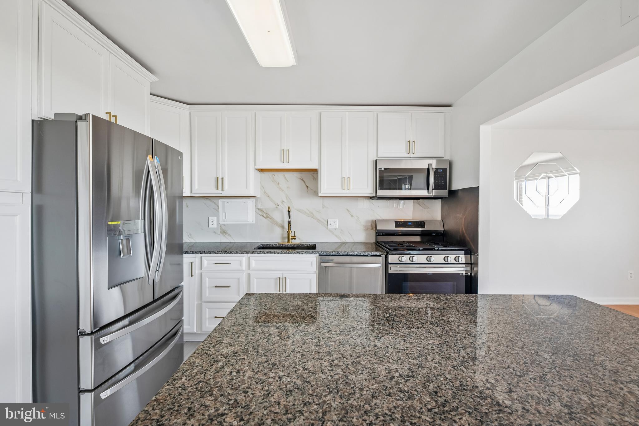 1836 Metzerott Road, Unit 2002 Hyattsville, MD 20783 - Photo 22 of 45 Kitchen