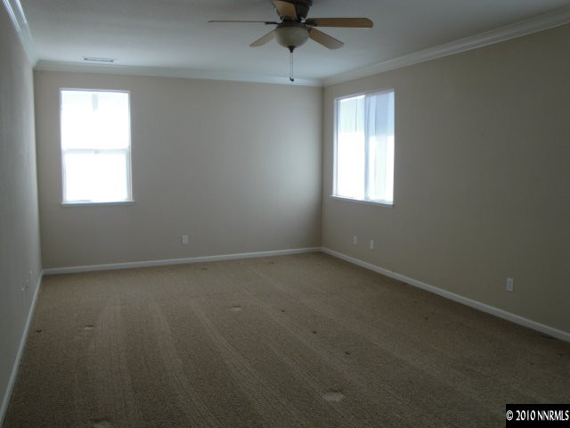 11335 Torino Way Reno, NV 89521 - Photo 5 of 9 an empty room with a window