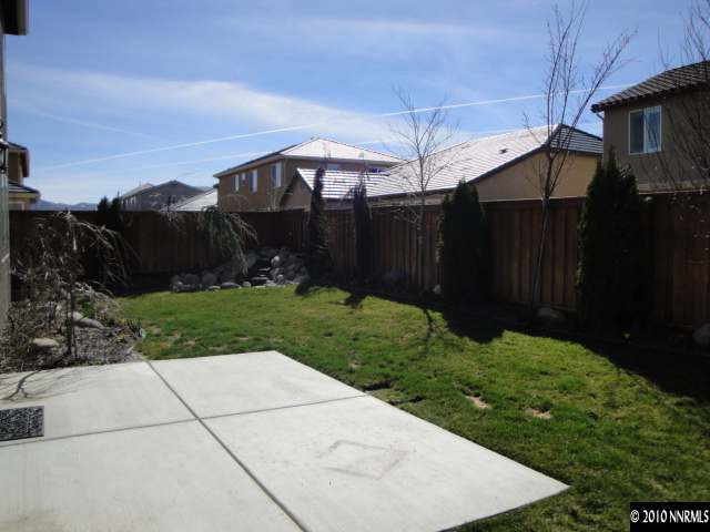11335 Torino Way Reno, NV 89521 - Photo 8 of 9 a view of a backyard