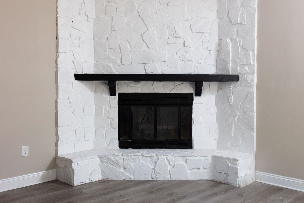 3941 Baybrook Drive Pace, FL 32571 - Photo 12 of 28 a view of fireplace and wooden floor