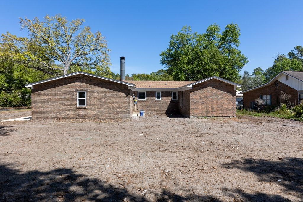 3941 Baybrook Drive Pace, FL 32571 - Photo 22 of 28 a view of front of a house with a yard