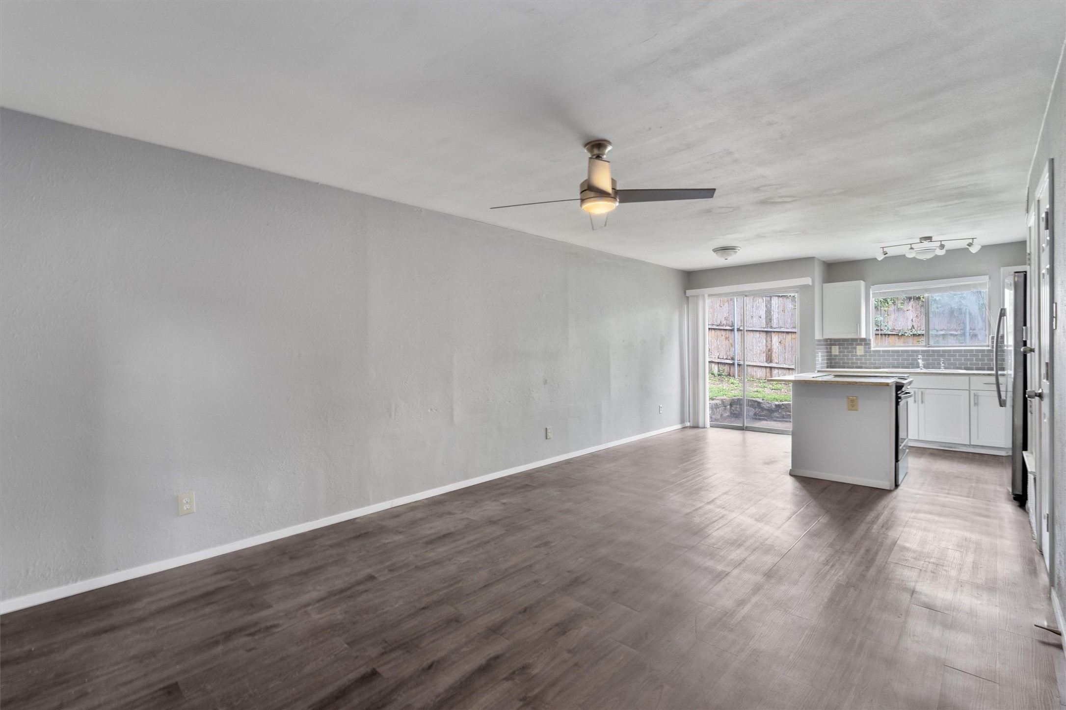 3415 Menchaca Road, Unit 113 Austin, TX 78704 - Photo 2 of 21 a view of kitchen and windows