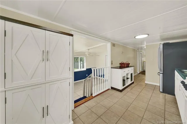 a room with a white walls and white doors