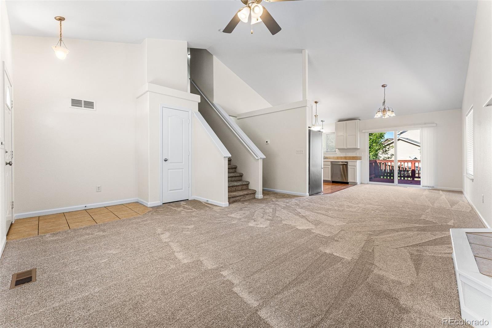 400 Sorrel Drive Windsor, CO 80550 - Photo 12 of 37 a view of a livingroom with a fireplace