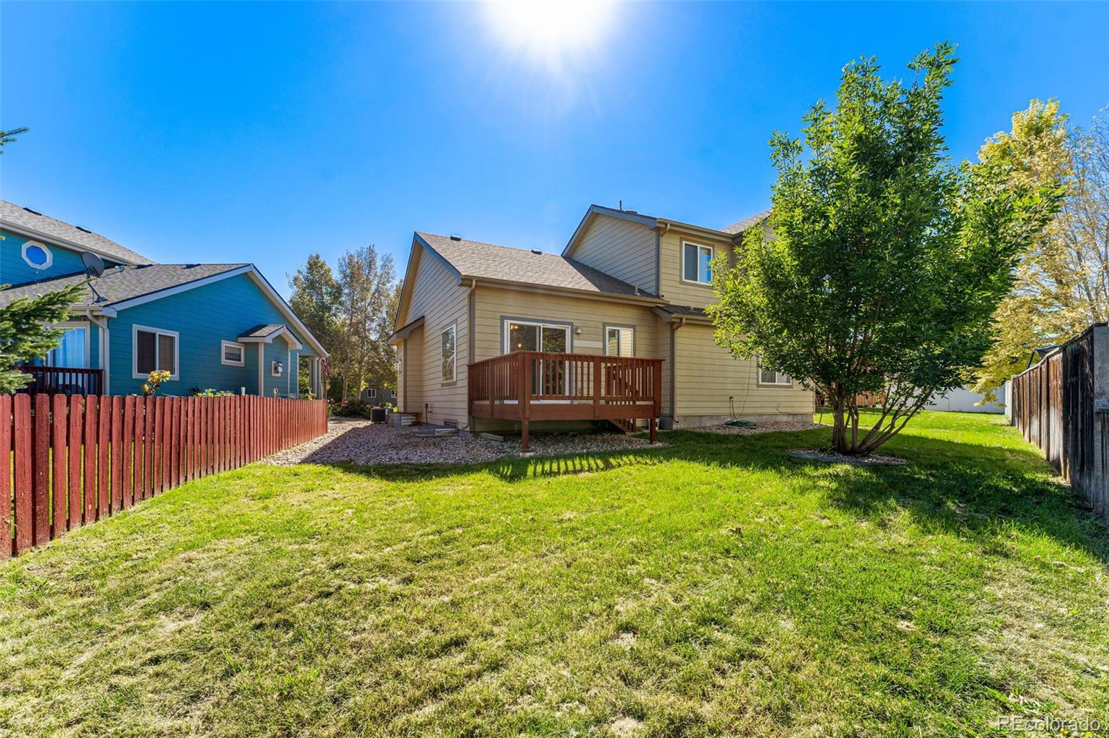400 Sorrel Drive Windsor, CO 80550 - Photo 28 of 37 a view of a house with a yard porch and sitting area