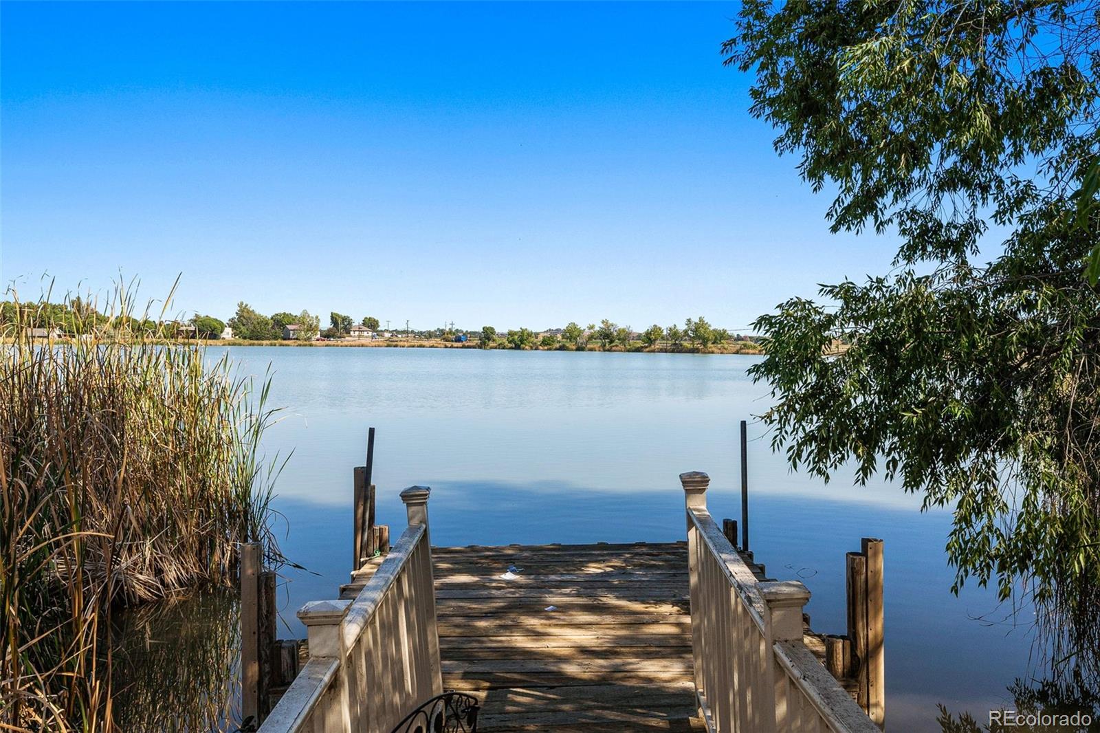 400 Sorrel Drive Windsor, CO 80550 - Photo 29 of 37 a view of a lake with a outdoor space