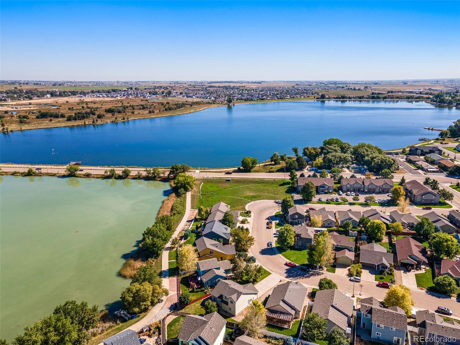400 Sorrel Drive Windsor, CO 80550 - Photo 34 of 37 an aerial view of ocean and residential houses with outdoor space