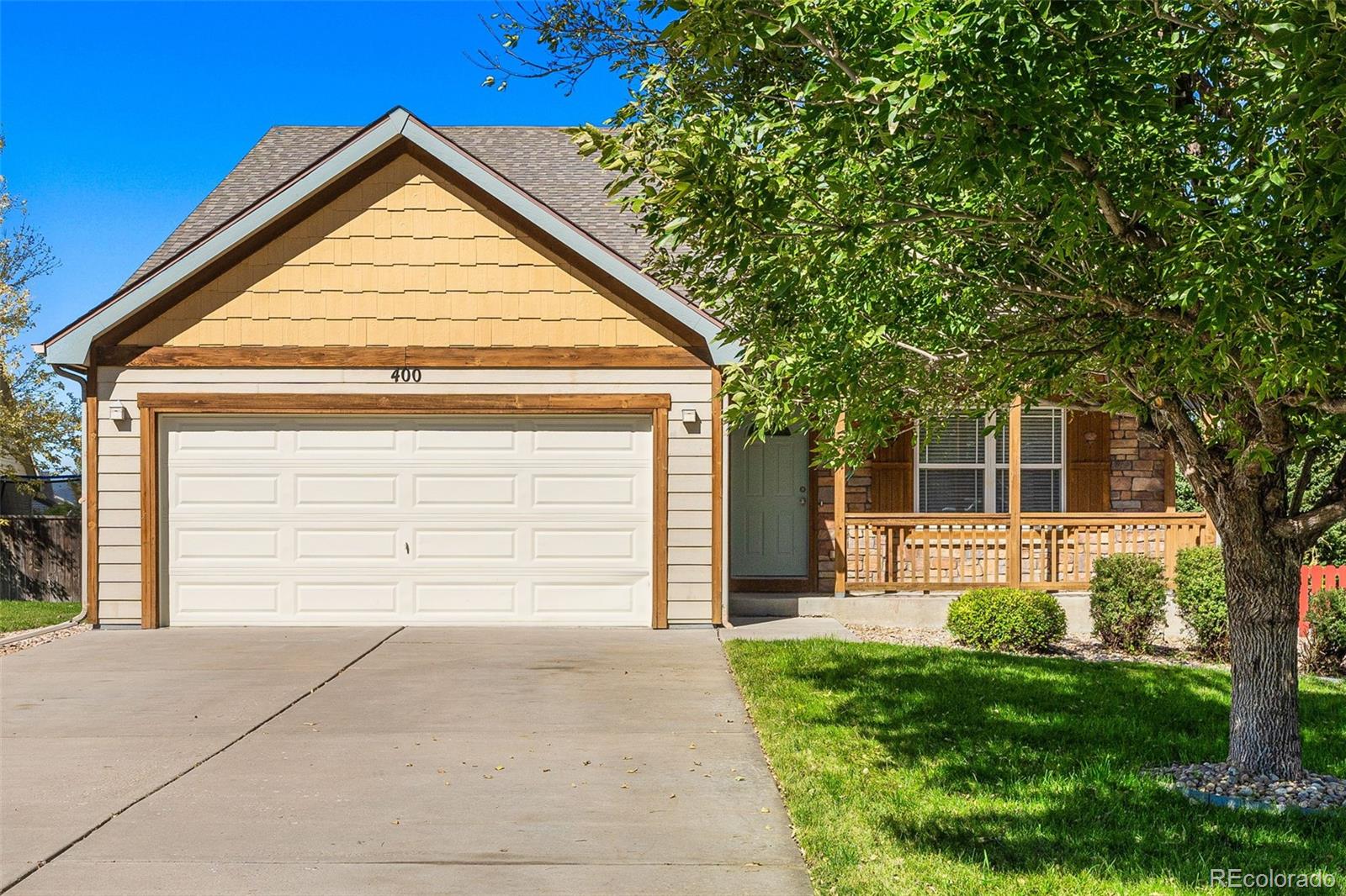 400 Sorrel Drive Windsor, CO 80550 - Photo 37 of 37 front view of a house with a yard