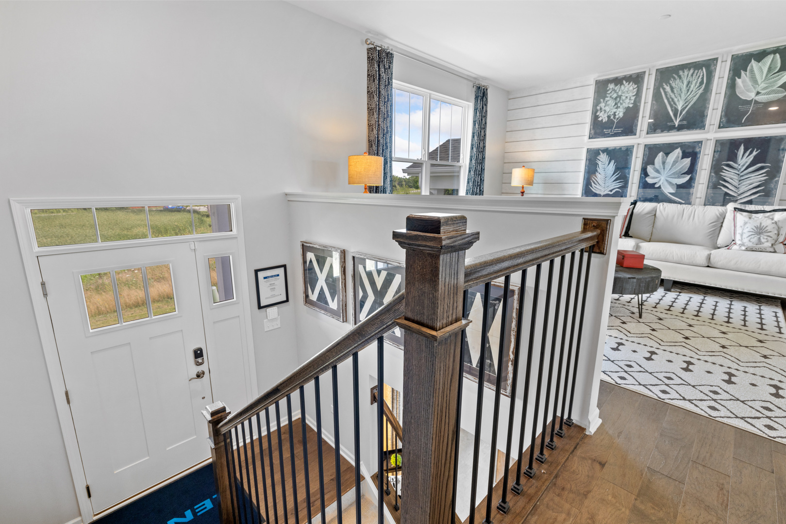 559 Wolverine Drive Aurora, IL 60502 - Photo 5 of 33 a view of a hallway with furniture and windows