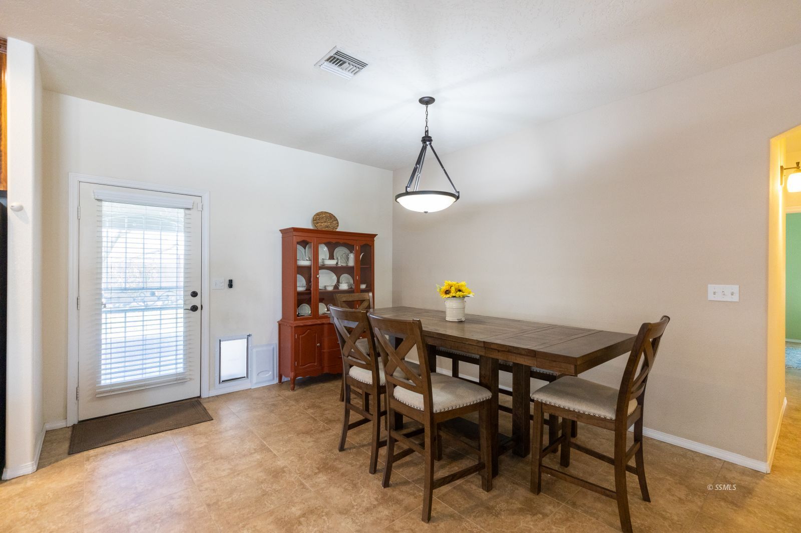 428 South Inyo Street Ridgecrest, CA 93555 - Photo 14 of 33 a view of a dining room with furniture and window