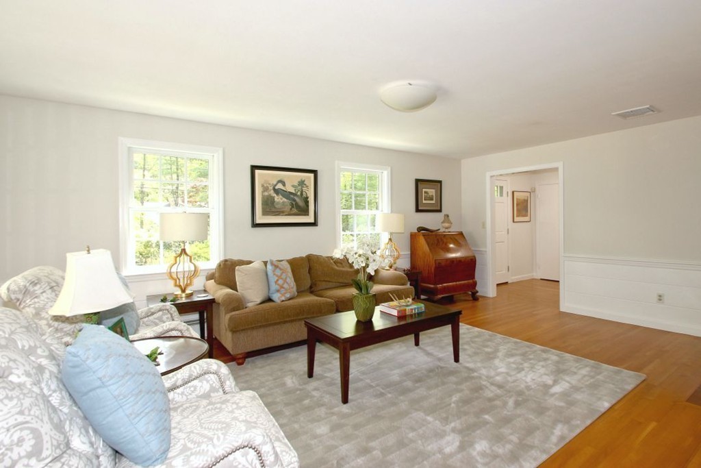 25 3 Ponds Road Wayland, MA 01778 - Photo 3 of 29 a living room with furniture and a window