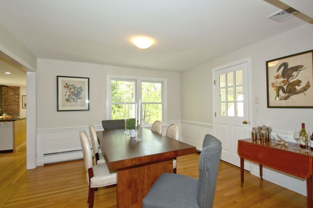 25 3 Ponds Road Wayland, MA 01778 - Photo 4 of 29 a view of a dining room with furniture and wooden floor
