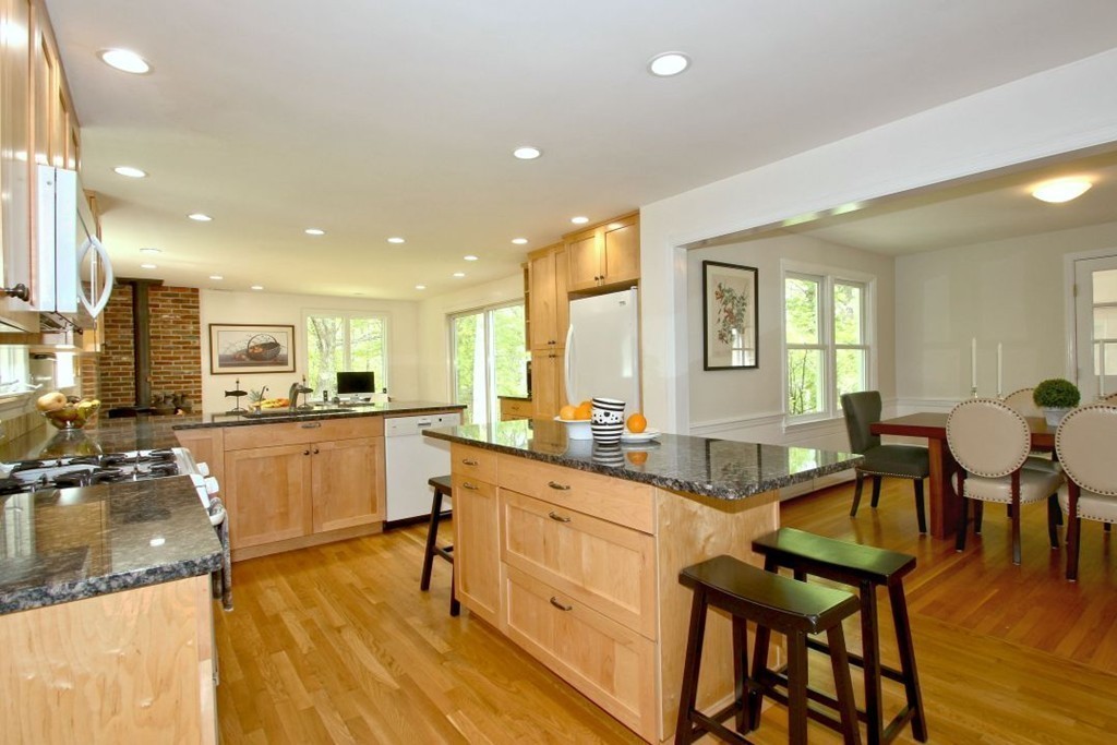 25 3 Ponds Road Wayland, MA 01778 - Photo 6 of 29 a kitchen with sink table and chairs