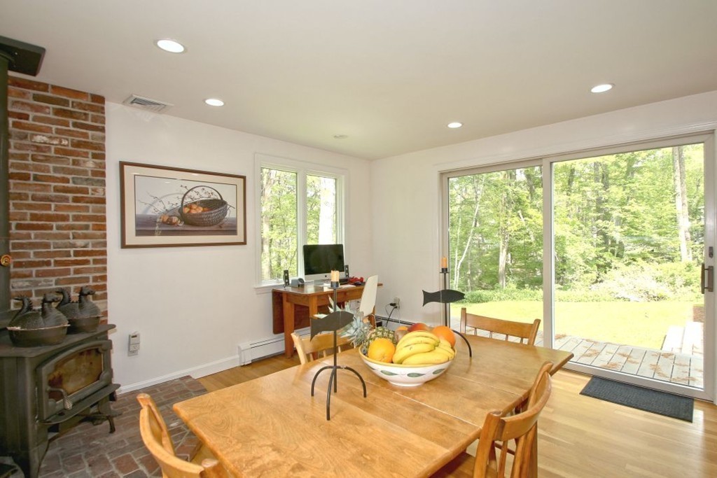 25 3 Ponds Road Wayland, MA 01778 - Photo 8 of 29 a view of a dining room with furniture window and outside view