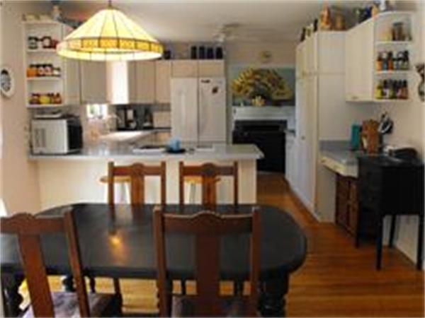 378 Burroughs Road Boxborough, MA 01719 - Photo 5 of 15 a view of a dining room with furniture and a chandelier