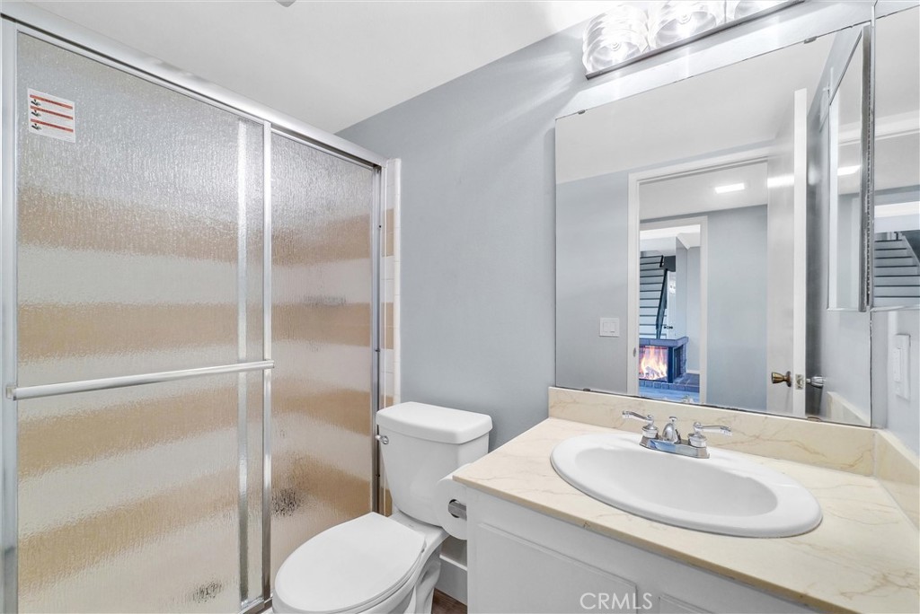 13966 Hammon Place Westminster, CA 92683 - Photo 11 of 45 a bathroom with a sink toilet and shower