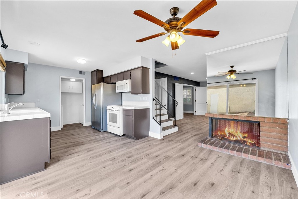13966 Hammon Place Westminster, CA 92683 - Photo 12 of 45 a view of kitchen with furniture and wooden floor
