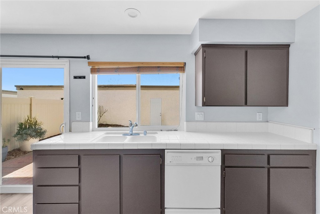 13966 Hammon Place Westminster, CA 92683 - Photo 15 of 45 a bathroom with a sink and a mirror