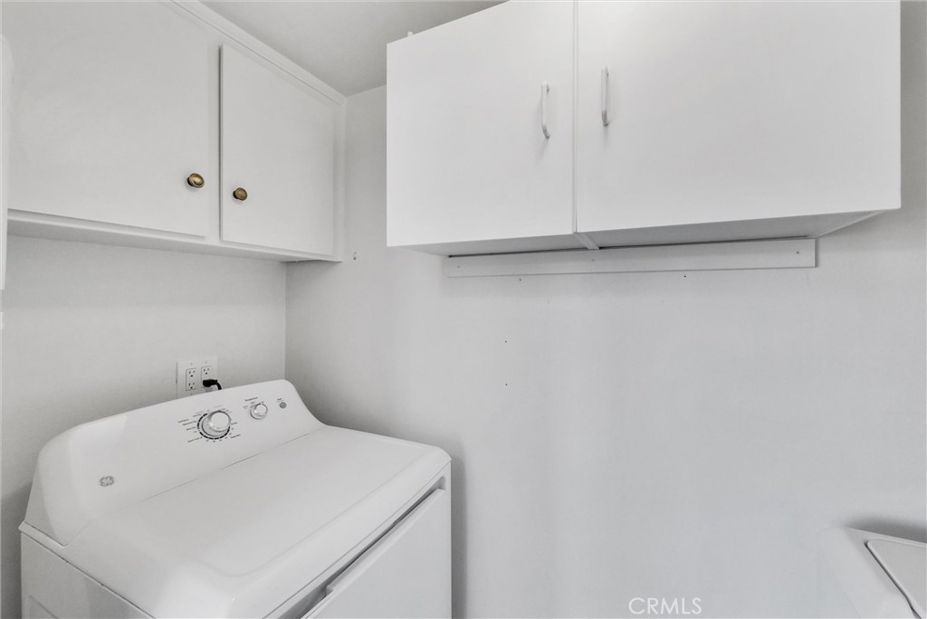 13966 Hammon Place Westminster, CA 92683 - Photo 16 of 45 a close up of a white cabinet