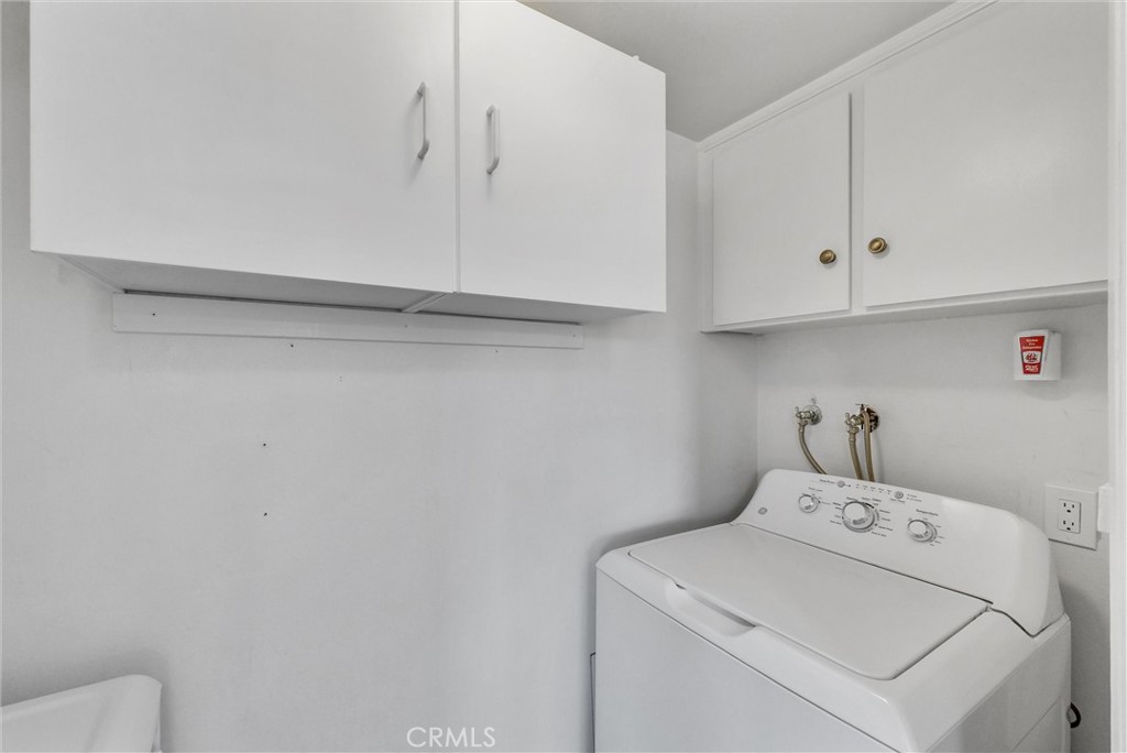13966 Hammon Place Westminster, CA 92683 - Photo 17 of 45 a utility room with dryer and washer