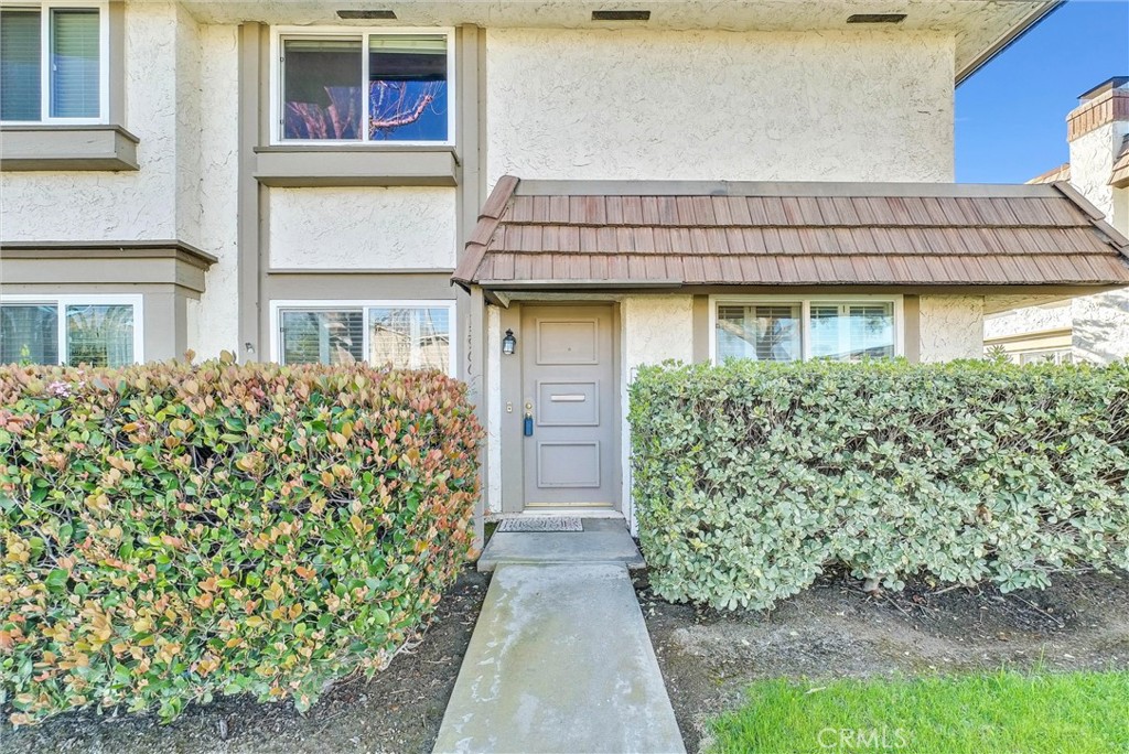 13966 Hammon Place Westminster, CA 92683 - Photo 3 of 45 a front view of a house with garden