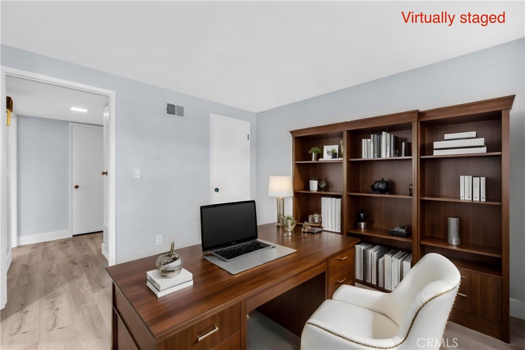 13966 Hammon Place Westminster, CA 92683 - Photo 9 of 45 a view of a workspace with furniture