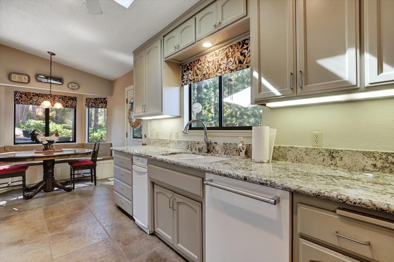 17682 Alexandra Way Grass Valley, CA 95949 - Photo 14 of 55 a kitchen with a sink and a window