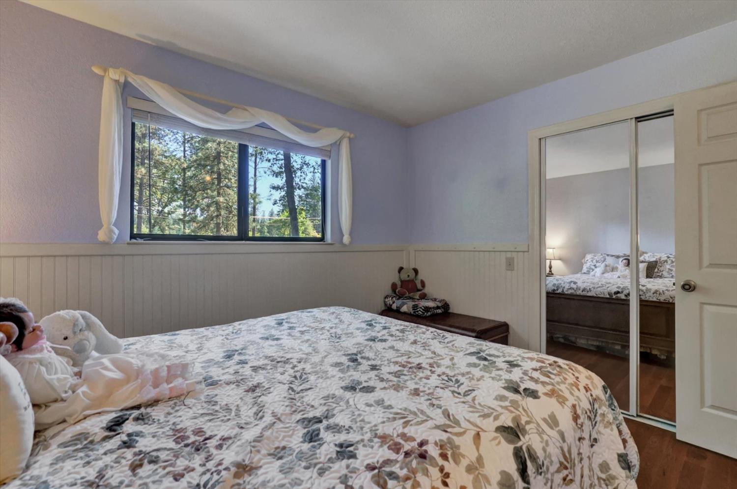 17682 Alexandra Way Grass Valley, CA 95949 - Photo 27 of 55 a bedroom with a bed and a dresser