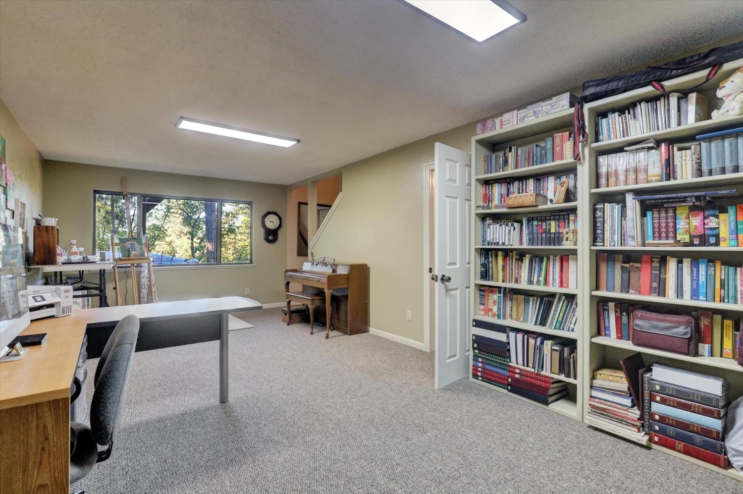 17682 Alexandra Way Grass Valley, CA 95949 - Photo 34 of 55 a view of a livingroom with workspace and workspace