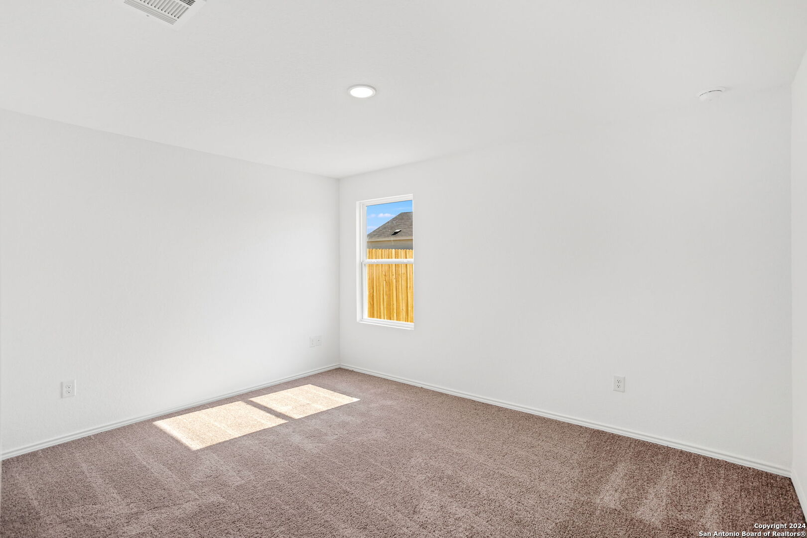 942 Landon Ridge San Antonio, TX 78253 - Photo 17 of 38 a view of an empty room with a window