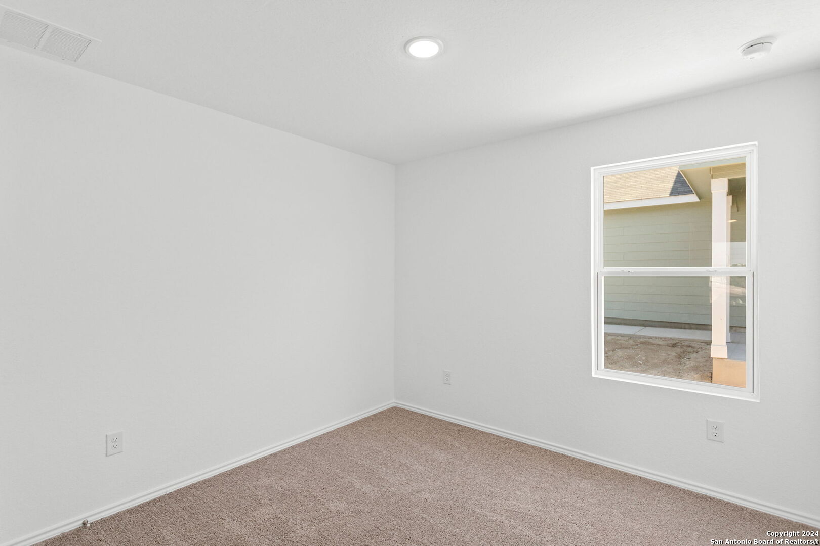 942 Landon Ridge San Antonio, TX 78253 - Photo 22 of 38 an empty room with a window