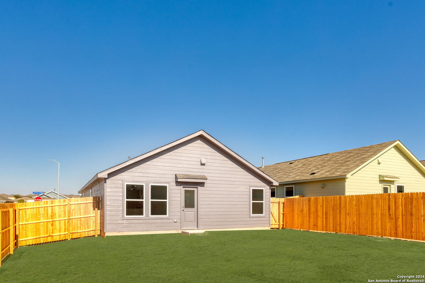 942 Landon Ridge San Antonio, TX 78253 - Photo 32 of 38 a view of a backyard with large tree