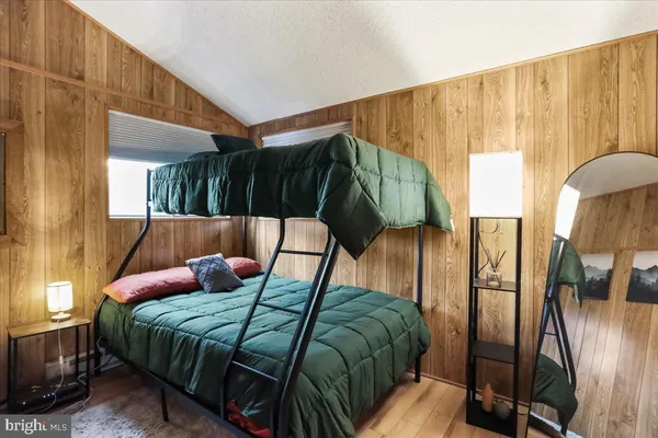 a view of balcony with wooden floor
