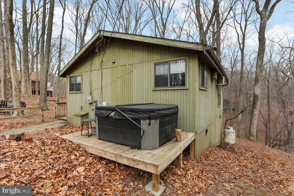 a view of a house with a sink and wooden floor