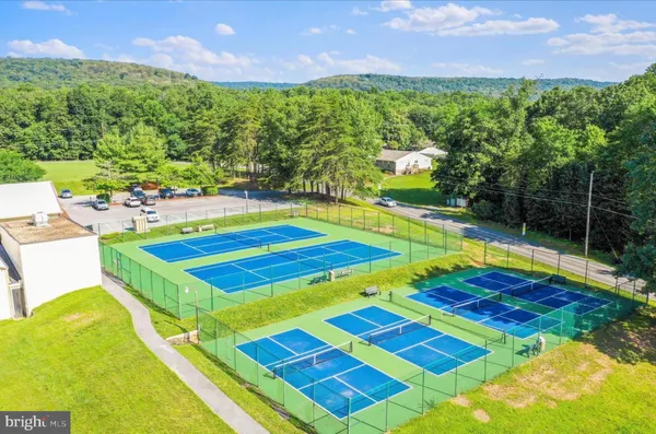 a view of a lake with a deck