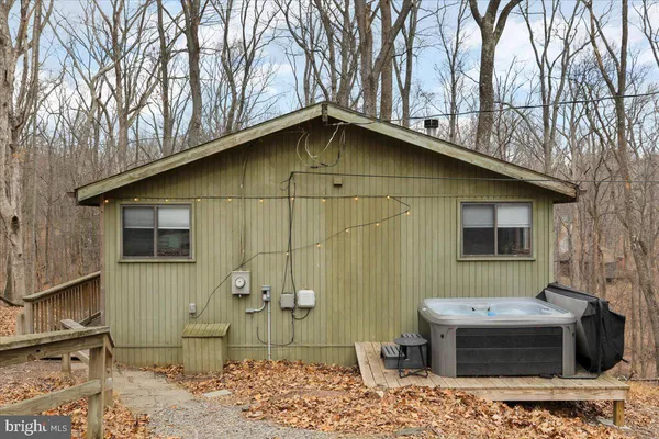 a house view with a backyard space