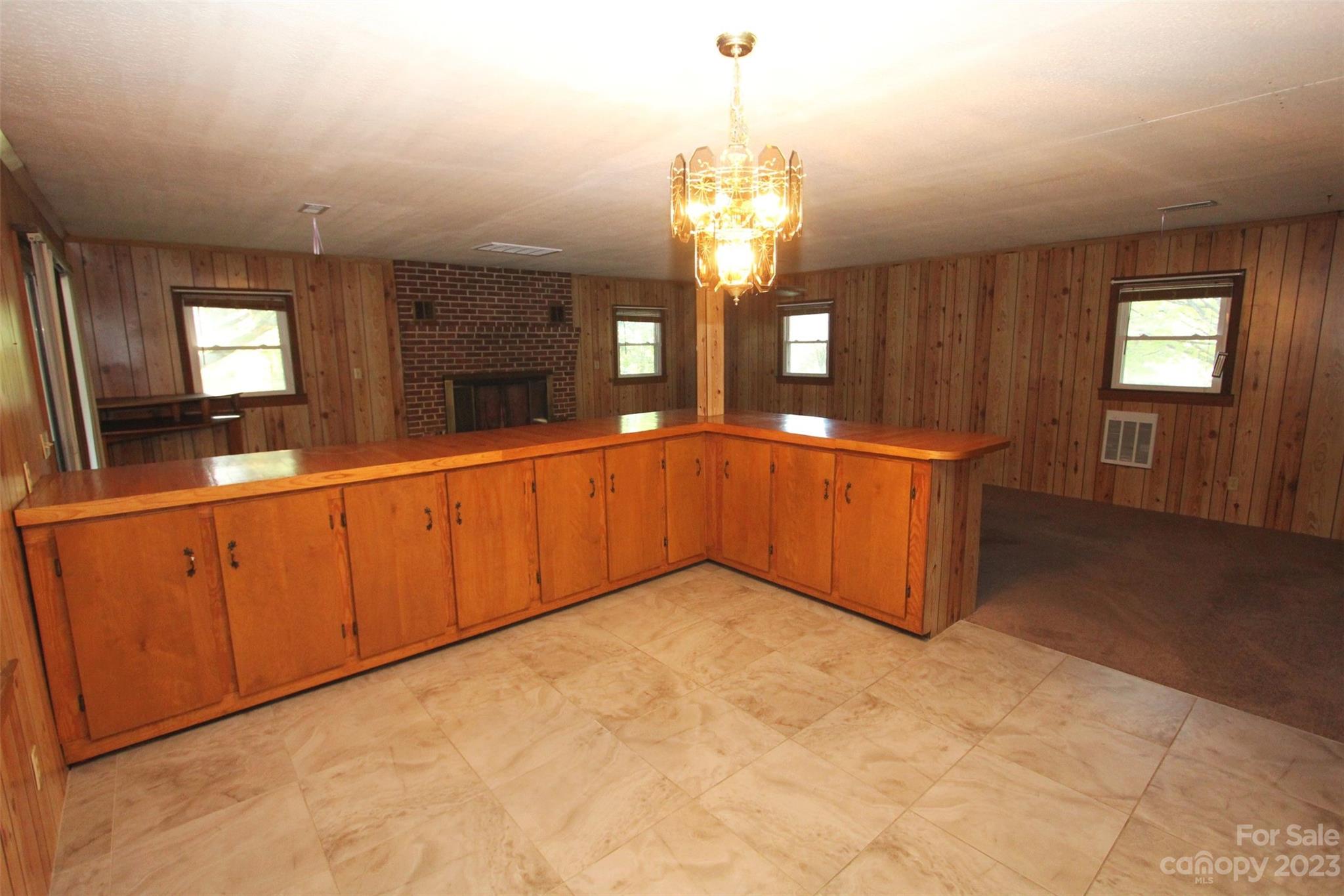 144 Allen Pond Road Wadesboro, NC 28170 - Photo 12 of 40 a large room with chandelier in it