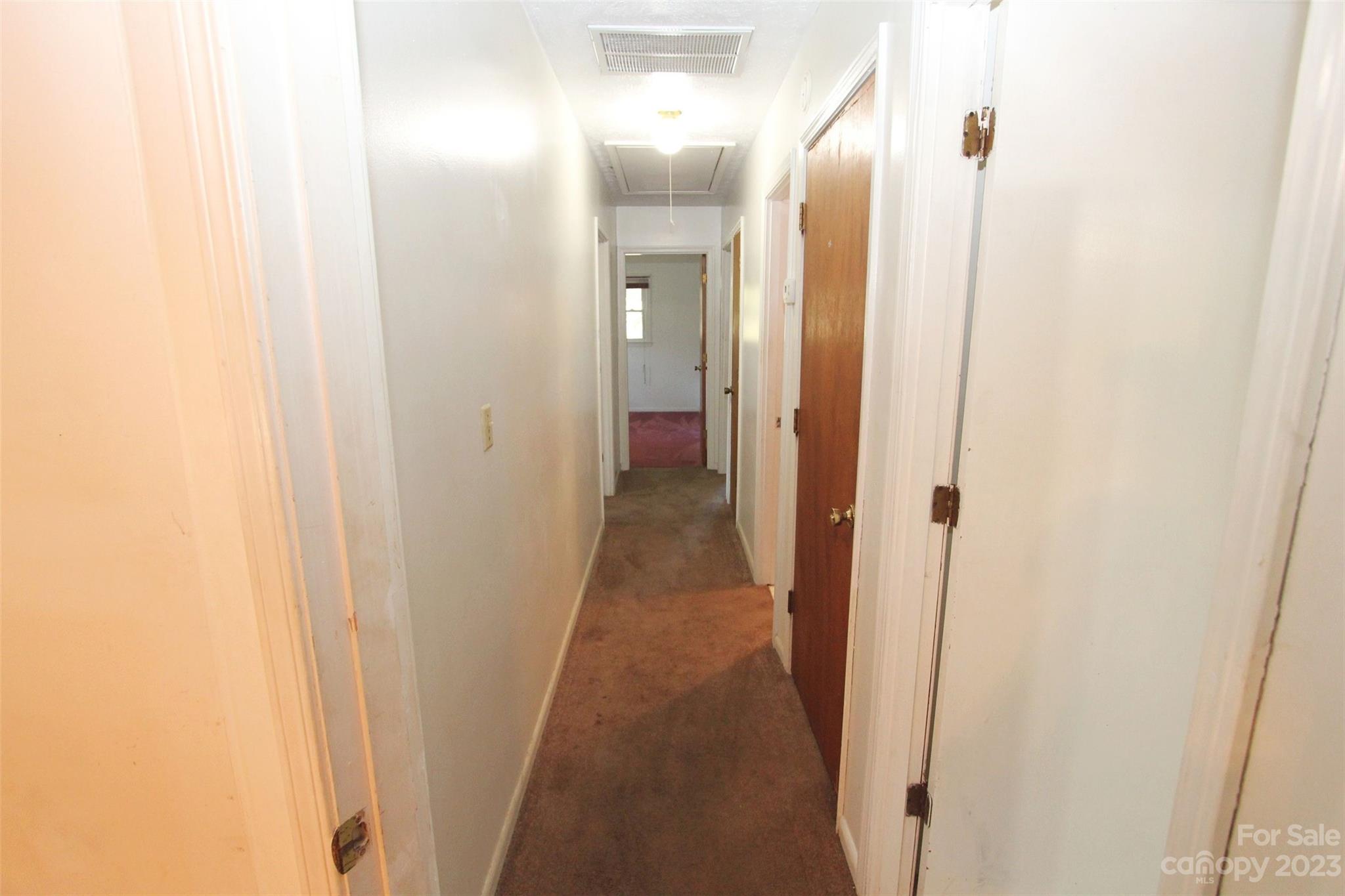 144 Allen Pond Road Wadesboro, NC 28170 - Photo 17 of 40 a view of a bathroom from a hallway