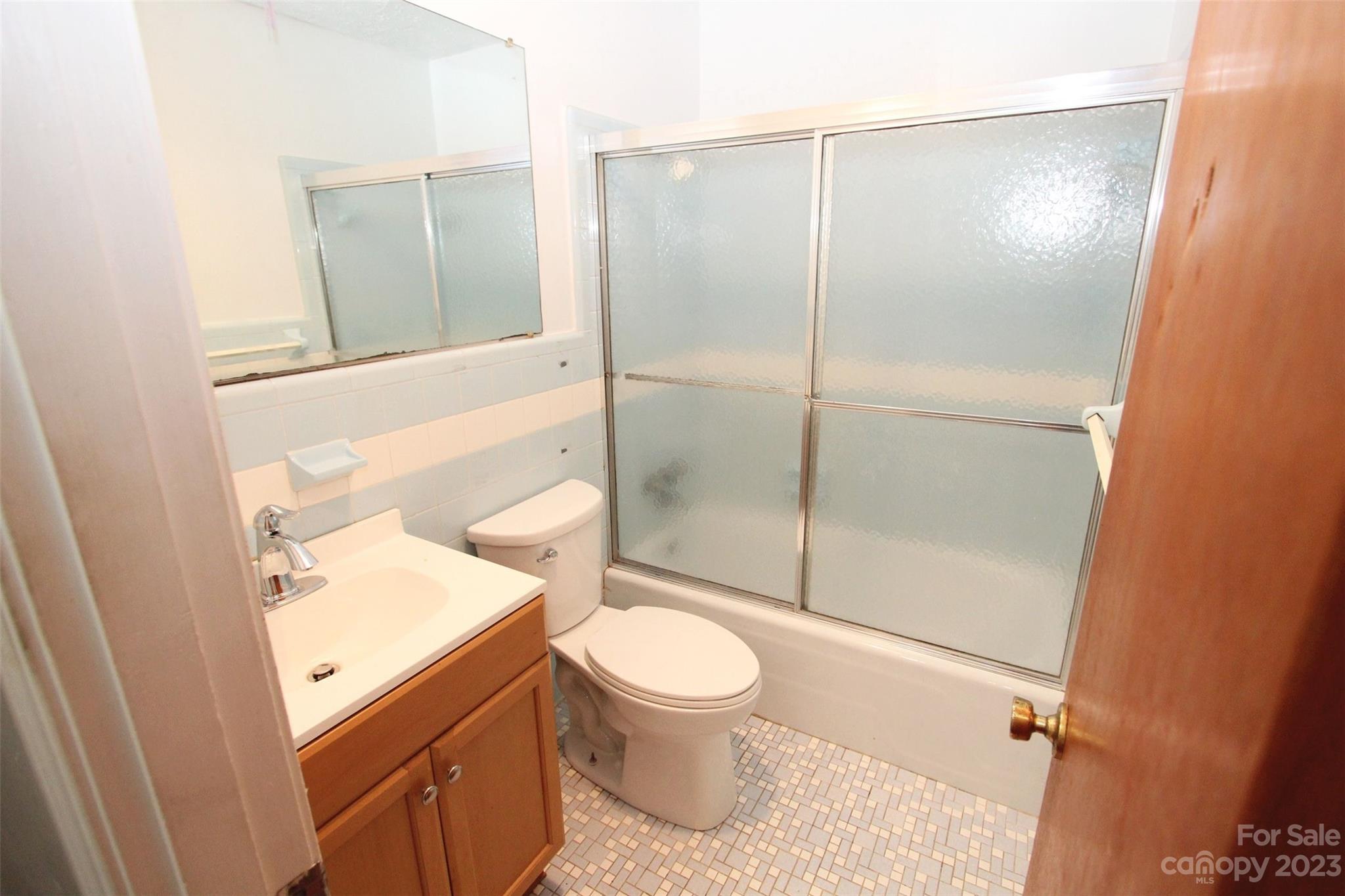 144 Allen Pond Road Wadesboro, NC 28170 - Photo 18 of 40 a bathroom with a granite countertop sink toilet and shower