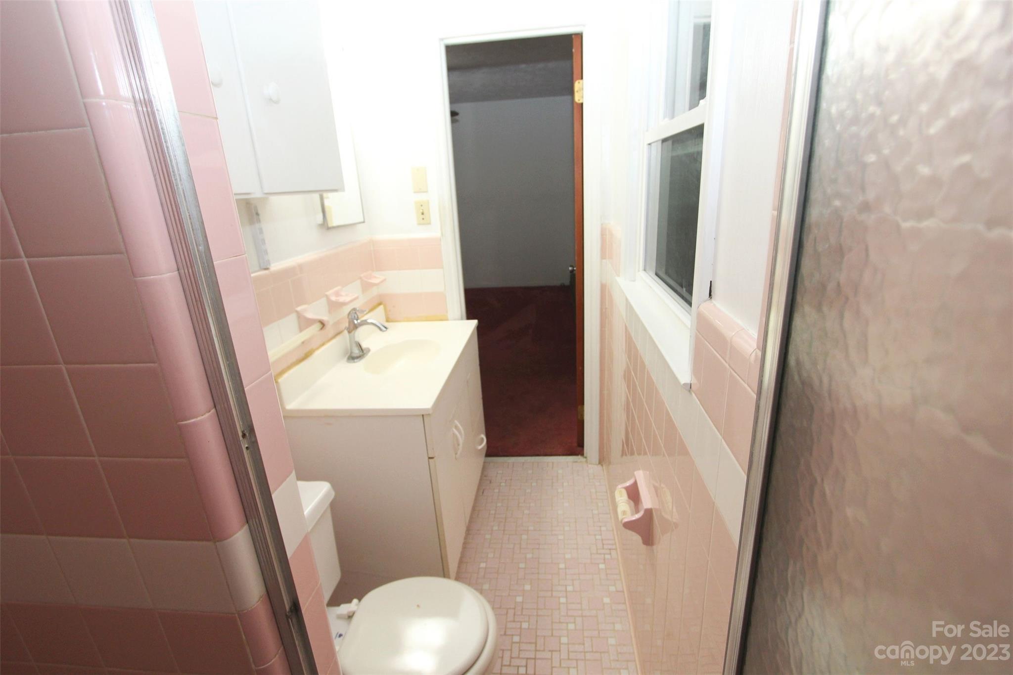 144 Allen Pond Road Wadesboro, NC 28170 - Photo 27 of 40 a bathroom with a sink and toilet