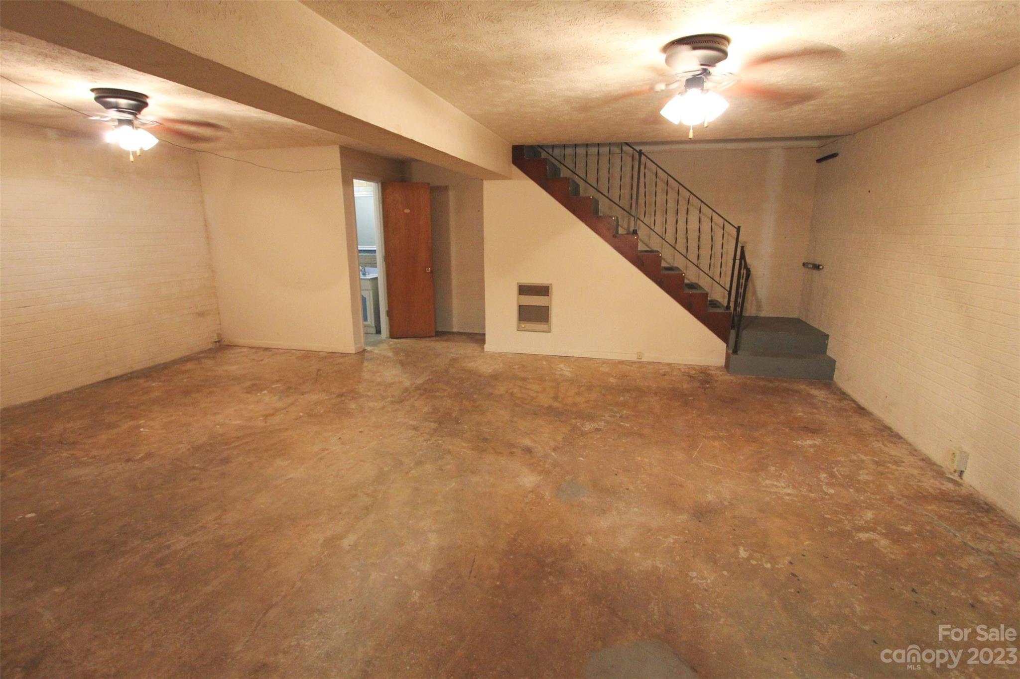 144 Allen Pond Road Wadesboro, NC 28170 - Photo 29 of 40 a view of empty room with wooden floor