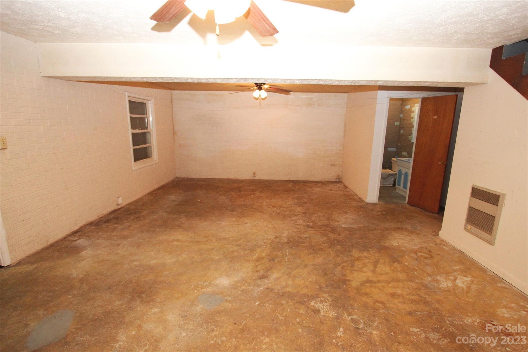 144 Allen Pond Road Wadesboro, NC 28170 - Photo 31 of 40 an empty room with windows