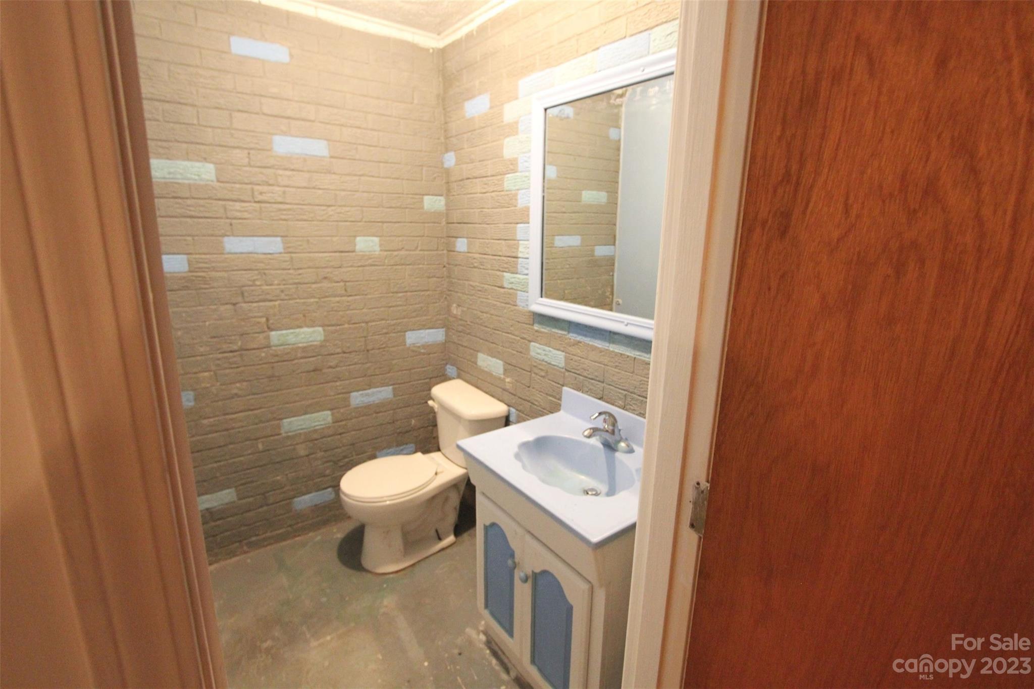 144 Allen Pond Road Wadesboro, NC 28170 - Photo 32 of 40 a bathroom with a sink a toilet and shower