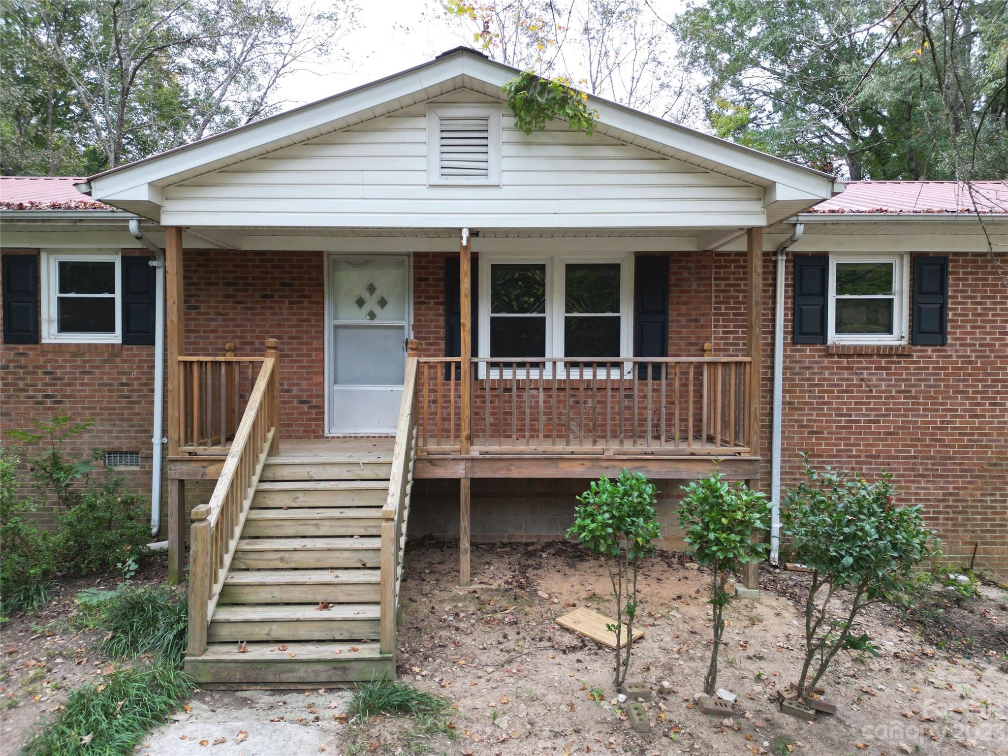 144 Allen Pond Road Wadesboro, NC 28170 - Photo 5 of 40 a front view of a house with a yard