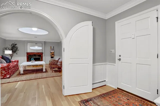 a view of livingroom with furniture and workspace