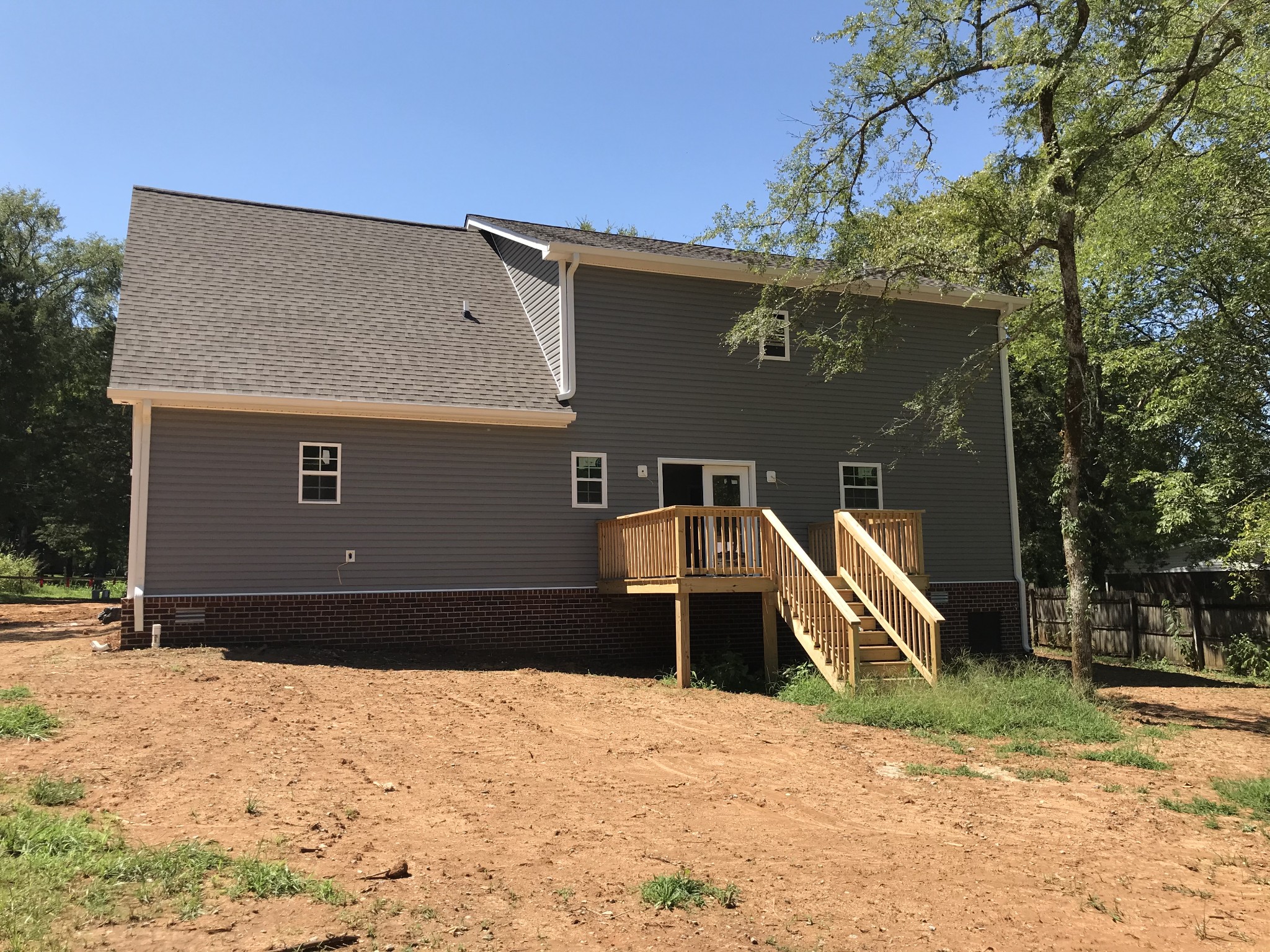 1141 Hamilton Chambers Road Lebanon, TN 37087 - Photo 4 of 15 a front view of a house with a yard